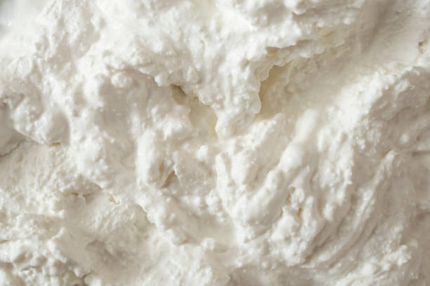 istock Cottage cheese from free range farm cows, close up texture 1470933930