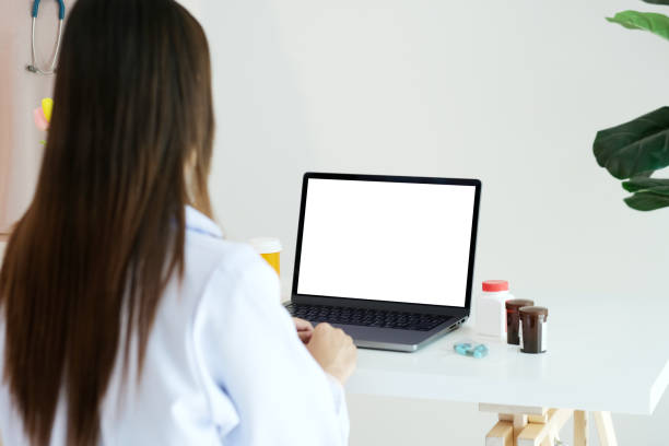 Woman using laptop computer with blank screen for mock up template background, people business technology and lifestyle background concept