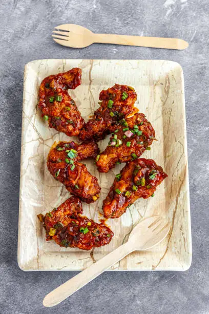 Vertical Directly Above Photo of Sticky Chicken Wings in a Plate, Take-Out Food