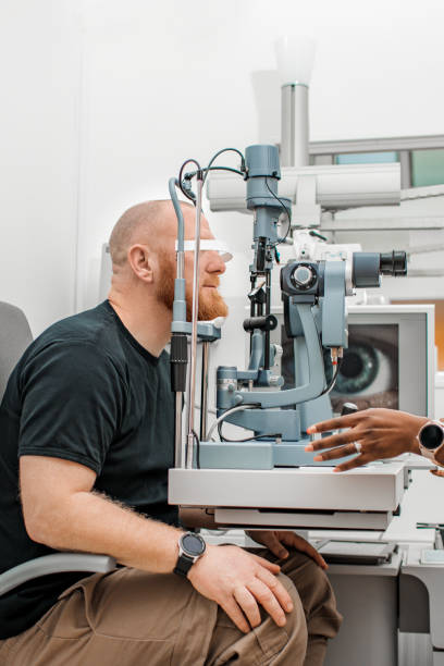 istock Redhead man during a fitting for contact lenses 1470936109
