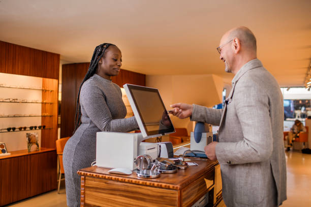 istock Beautiful black female customer buying glasses 1470937100