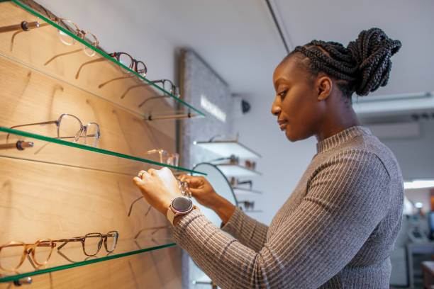 istock Beautiful black female sales assistant in an opticians 1470937936