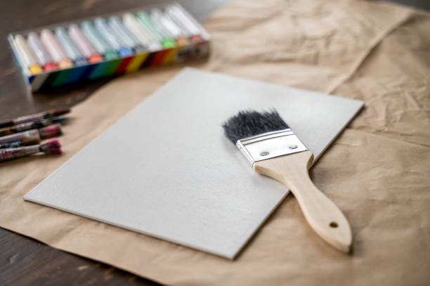 istock Canvas with brushes and paint ready to use 1470938125