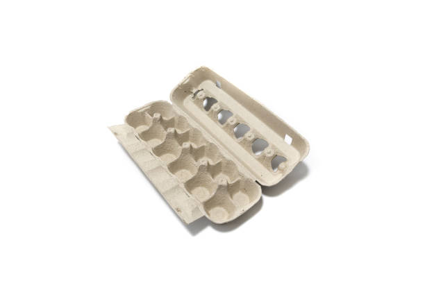 istock An egg carton container, for a dozen eggs. Isolated on a white background. 1470939817