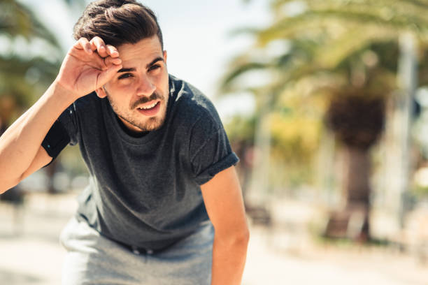 istock tired man sweating after the run 1470940066