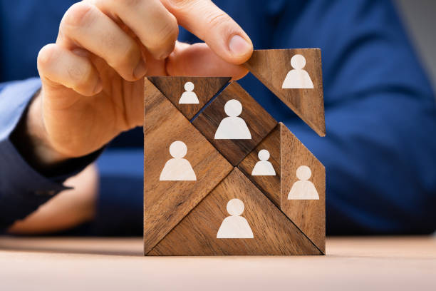 istock HR Recruitment Hand Making Tangram Puzzle 1470940479