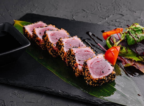 sushi tuna steak with sesame seeds stock photo