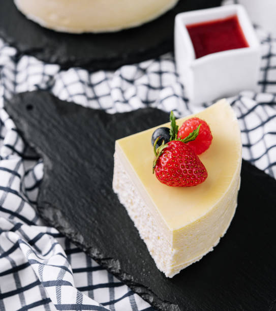 istock Fresh strawberry cheesecake on black tray 1470943705