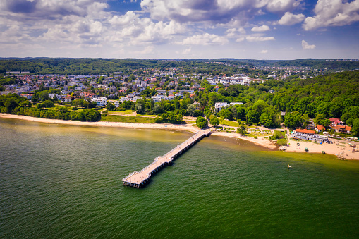 Aerial landscape of the beach and pier of the Baltic Sea in Gdynia Orlowo at summer, Poland.