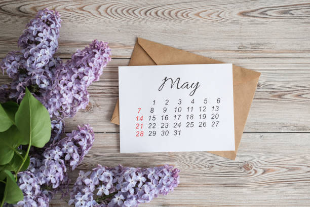 May calendar and spring flowers