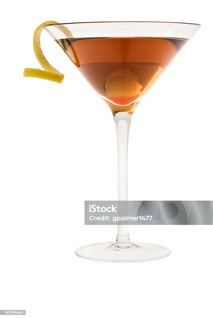 dry manhattan cocktail or Rob Roy on a white background Dry Manhattan Cocktail with lemon peel on white background Vermouth Stock Photo