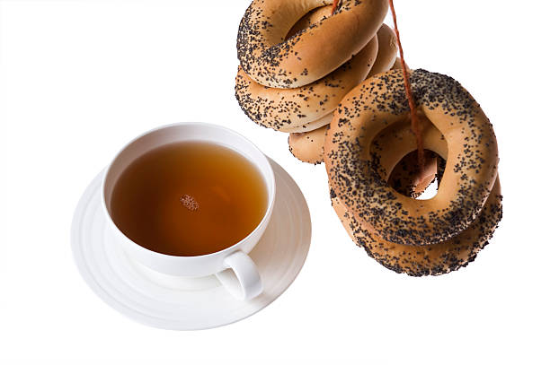 cup of tea and bagels stock photo