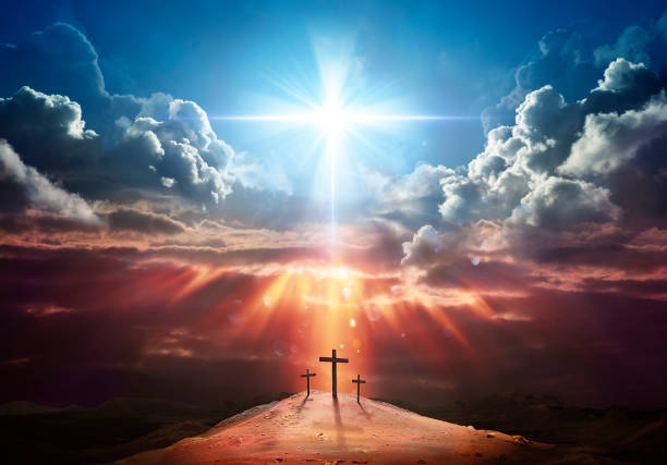 Resurrection - Light Cross Shape In Clouds - Risen - Jesus Ascends to Heaven Scene stock photo