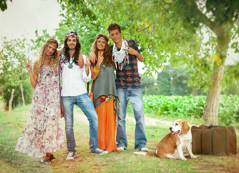istock Hippies flower power: old fashioned group of friends with dog 1470952395