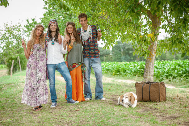 istock Hippies flower power: old fashioned group of friends with dog 1470952397