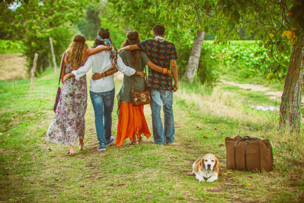istock Hippies flower power: old fashioned group of friends with dog 1470952562