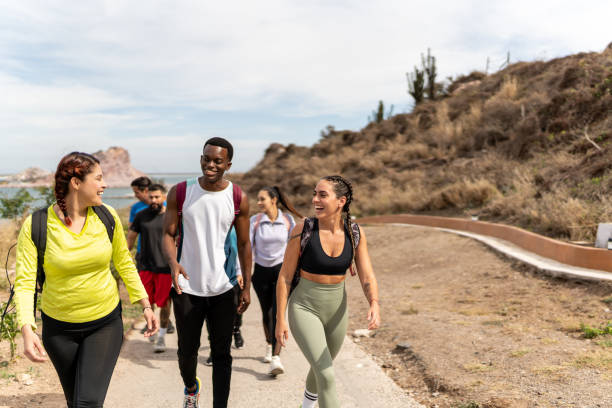 istock Friends having fun while hiking outdoors 1470955421