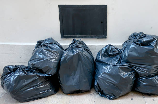 istock Garbage bags on street 1470956405