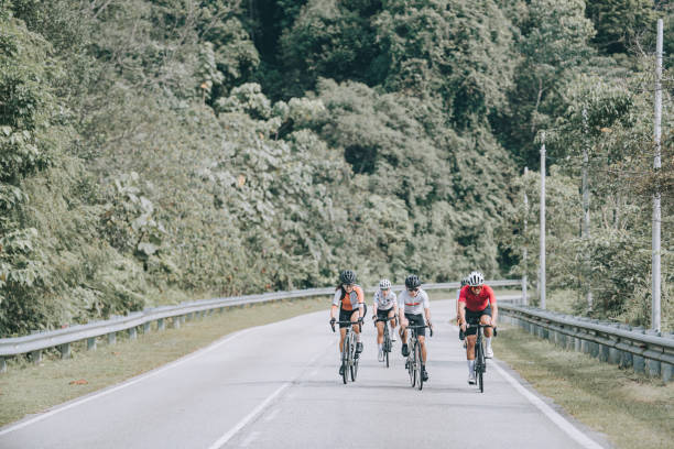 istock Asian Chinese cyclist friends practicing in rural scene 1470957107