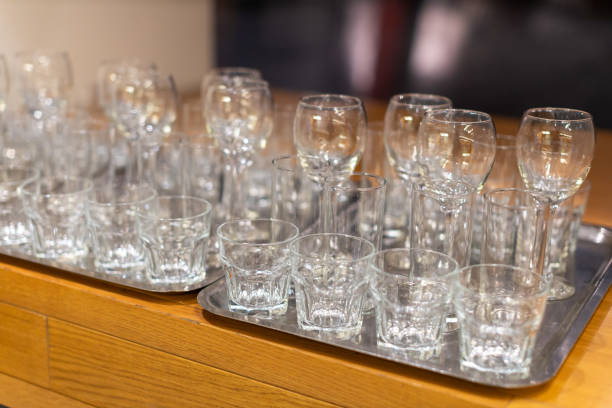 istock many drinking glasses on trays 1470957179