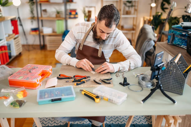istock Man makes fishing lures 1470957238