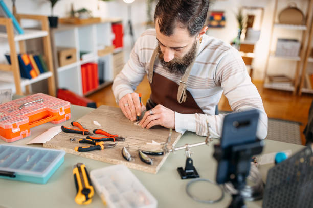 istock Man makes fishing lures 1470957239