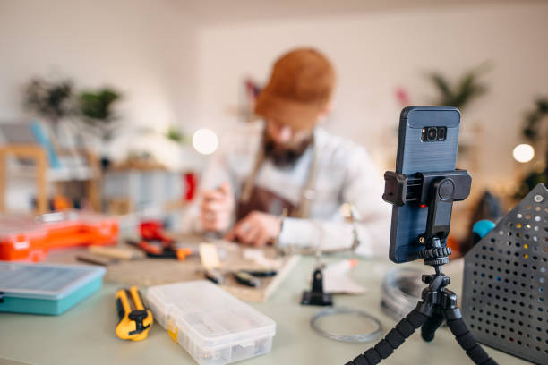 istock Man makes fishing lures 1470957775
