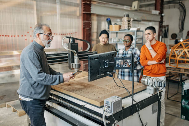 istock Creating the Future - Students Crafting with the CNC Machine 1470957958