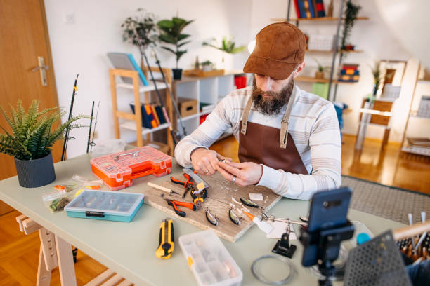 istock Man makes fishing lures 1470958544