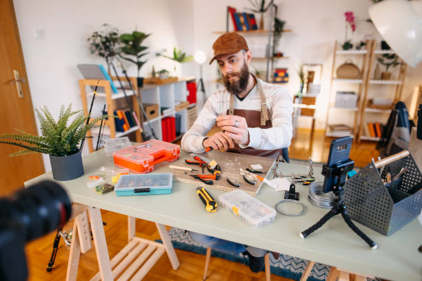 istock Man makes fishing lures 1470958751