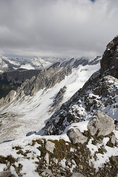 istock Cloudy view of mountain peaks 147095984