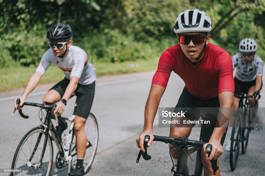 Asian Chinese cyclist in rural scene cycling event Cycling Stock Photo