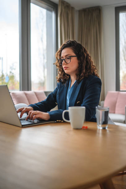 istock Young Caucasian Female Business Strategist Working With A Computer 1470961746