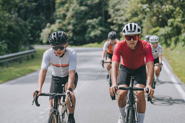 istock asian chinese mixed  gender cyclist practicing in rural scene weekend morning 1470961955