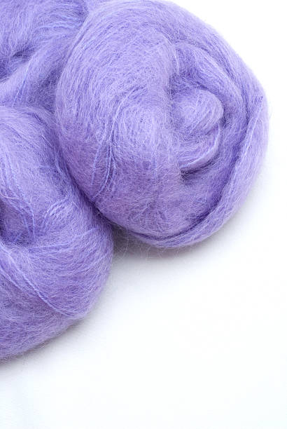 istock Purple Balls of Yarn 147096444