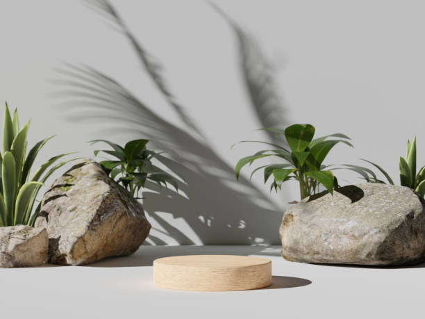 istock Green leaves and stone slabs product display, white podium 1470965880