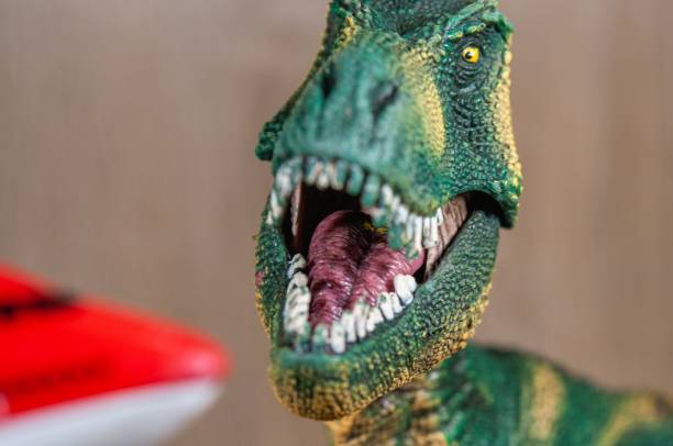 istock Closeup shot toy dinosaur with a blurred background 1470966950