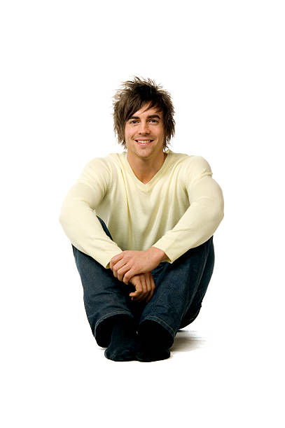 istock Young man sittting isolated on a white background 147096733