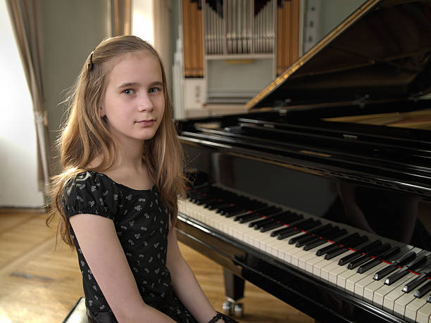 istock Girl at piano 147097033