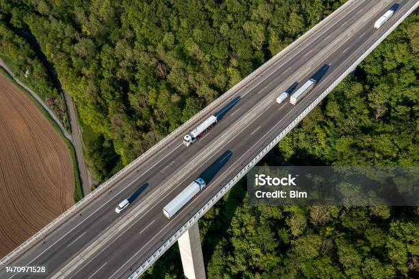 Truck Traffic On Highway Bridge Aerial View Stock Photo - Download Image Now - Truck, Above, Aerial View