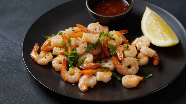 istock Homemade Sauteed Shrimps with Herbs and Lemon 1470974098
