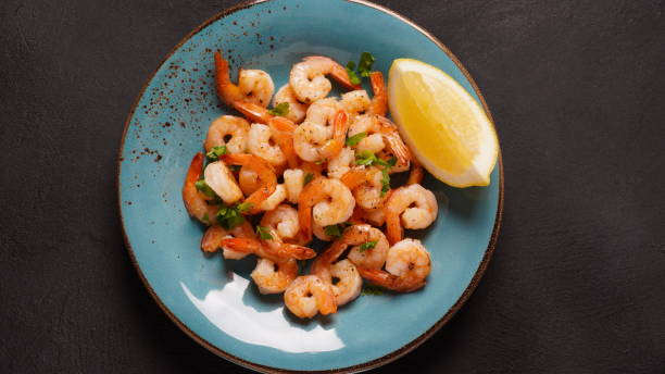 istock Homemade Sauteed Shrimps with Herbs and Lemon 1470974101