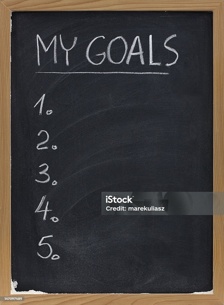 my goals list on blackboard my goals - blank numbered list handwritten with white chalk on blackboard with erase smudges Aspirations Stock Photo