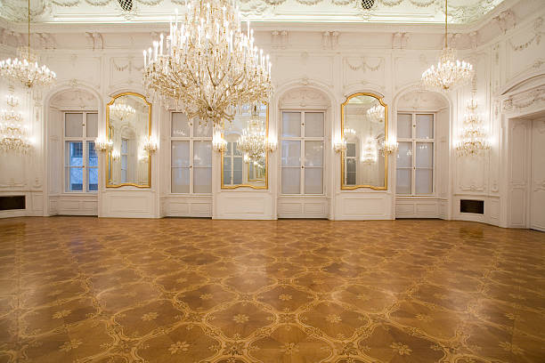 A luxurious interior of a castle with huge chandelier 