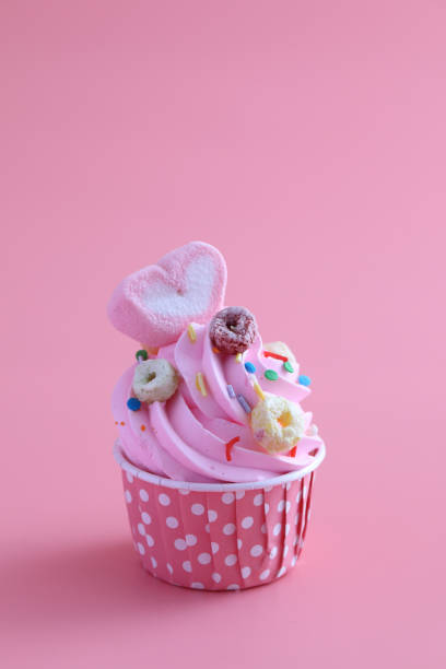 istock cupcake isolated in pink background 1470977878