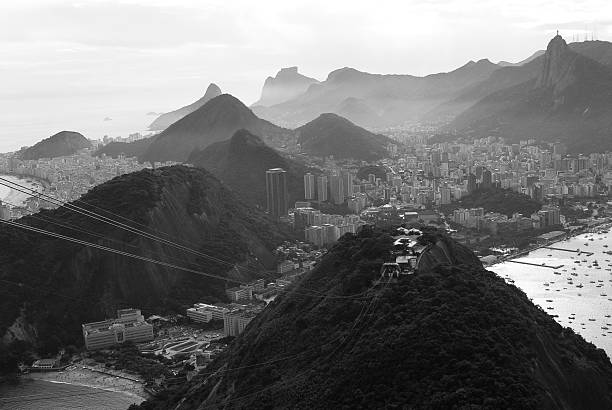 Rio de Janeiro skyline from the tram on the way to Sugarloaf Mountain.  Cristo de Redentor, Impanema Beach and Impanema Beach can be seen in the background