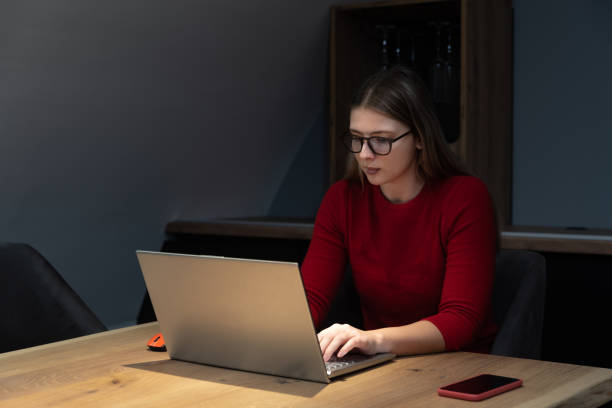istock Young freelancer woman expert webmaster web designer and developer working from home on a new website marketing site to improve customer accounts experience and ease to buy or book online 1470982822