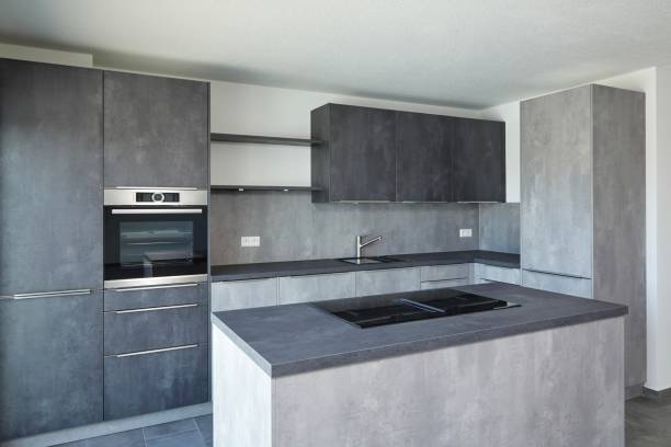 Gray kitchen with free-standing stove