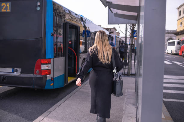 istock Woman taking the bus to University 1470983526