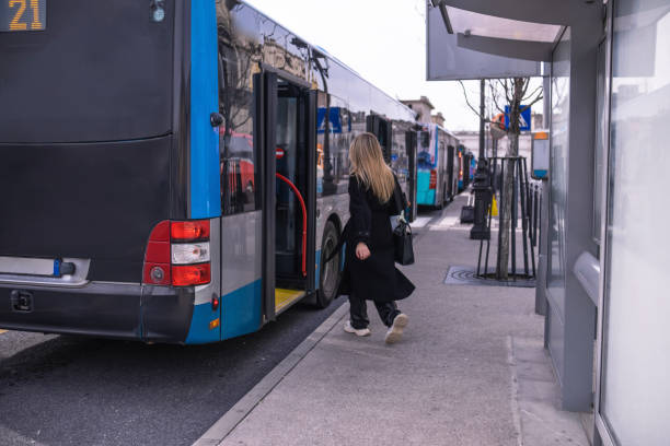 istock Woman taking the bus to University 1470983549